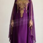 Royal purple Moroccan kaftan with heavy gold embroidery