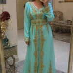 Turquoise and gold embroidered Moroccan kaftan dress with long sleeves, V-neckline, decorative belt and intricate floral gold detailing (1)