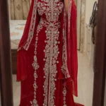 Red Moroccan bridal kaftan with silver embroidery matching veil and embellished waist belt (1)