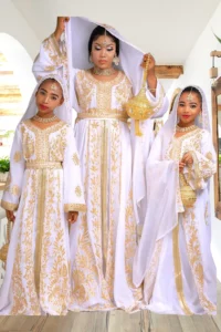 Elegant White & Gold Moroccan Kaftan for women and girls, featuring exquisite hand embroidery, flowing sleeves, and a hooded scarf—perfect for weddings & festive occasions (3)