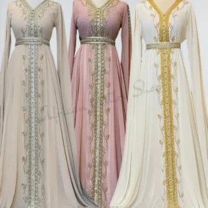 Beige, pink, and white Moroccan kaftan dresses with silver and gold embroidery for weddings and Eid
