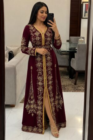 Burgundy Moroccan kaftan dress with intricate gold embroidery and beaded zari detailing (1)