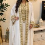 White Moroccan bridal kaftan dress with detailed gold embroidery and embellished front panel (1)