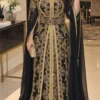 Black and gold Moroccan kaftan dress with detailed gold embroidery and flowing sleeves (1)