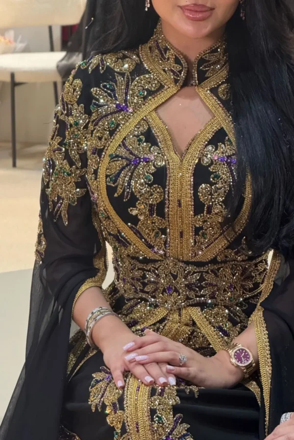 Black and gold Moroccan kaftan dress with detailed gold embroidery and flowing sleeves (4)