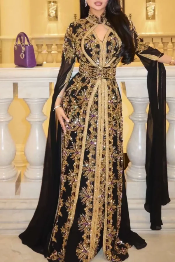 Black and gold Moroccan kaftan dress with detailed gold embroidery and flowing sleeves (5)